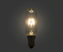 Ampoule tube E14 en verre clair allumée, filament incandescent lumineux, sur fond gris