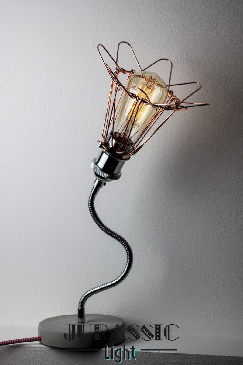 Cette lampe en béton au design épuré combinée à son ampoule Edison